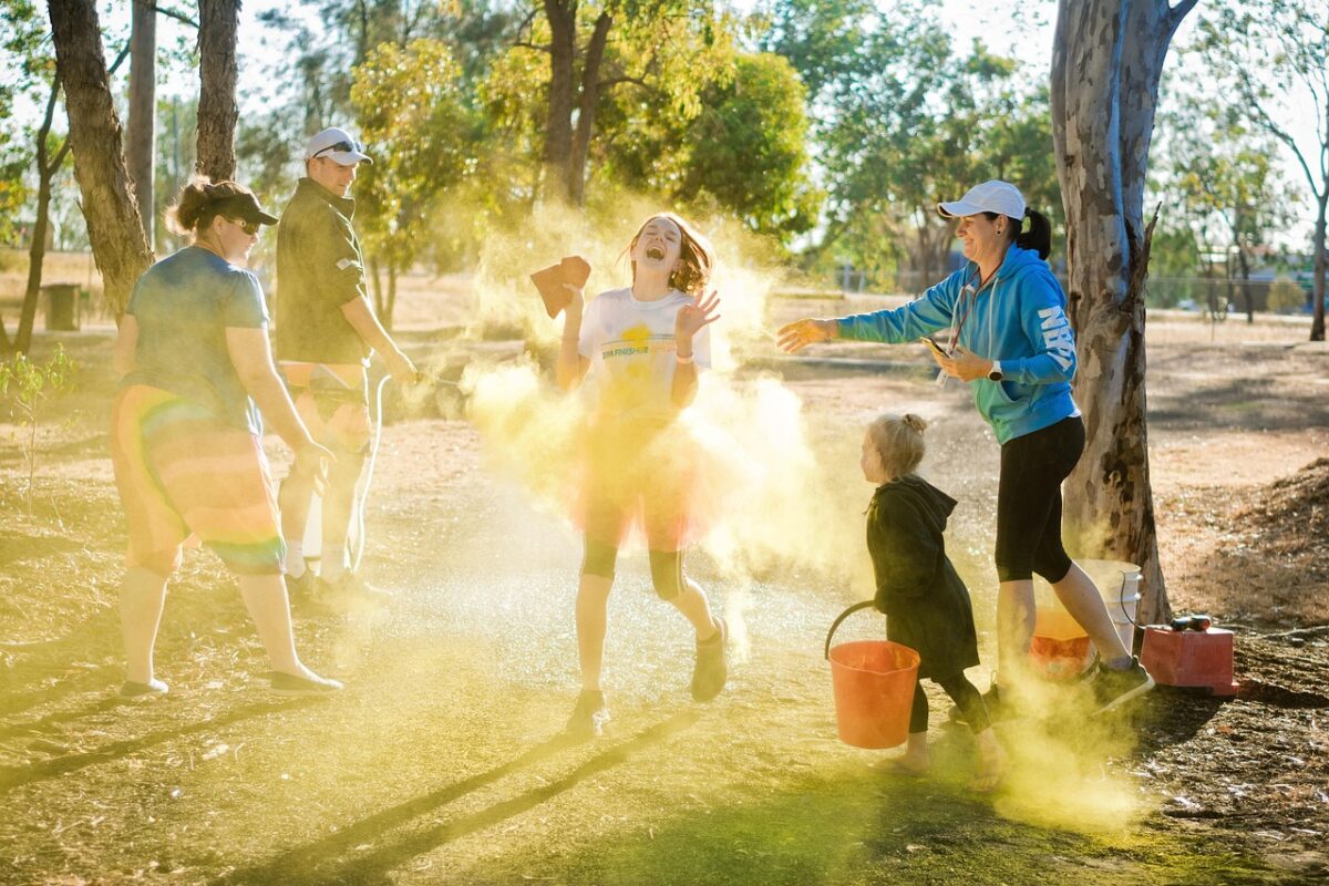 Adults and children playing a game together at home